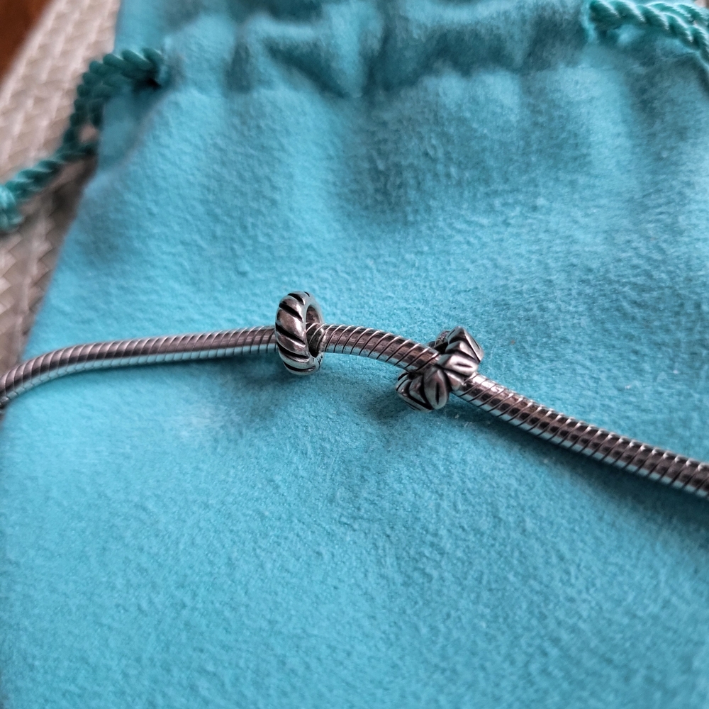 Two Pandora Spacer Silver Charms